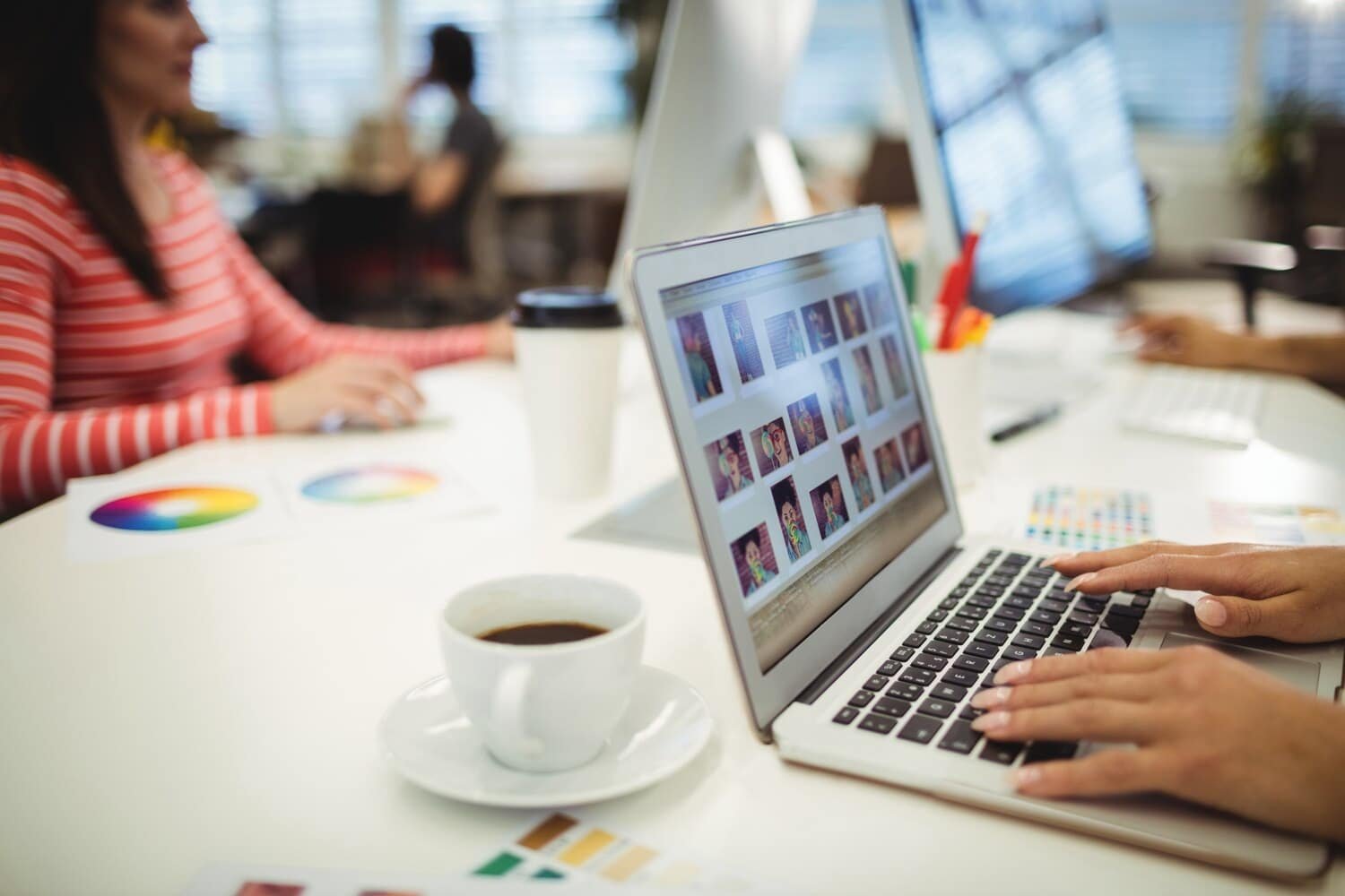 graphic-designers-working-their-desk_1170-1858